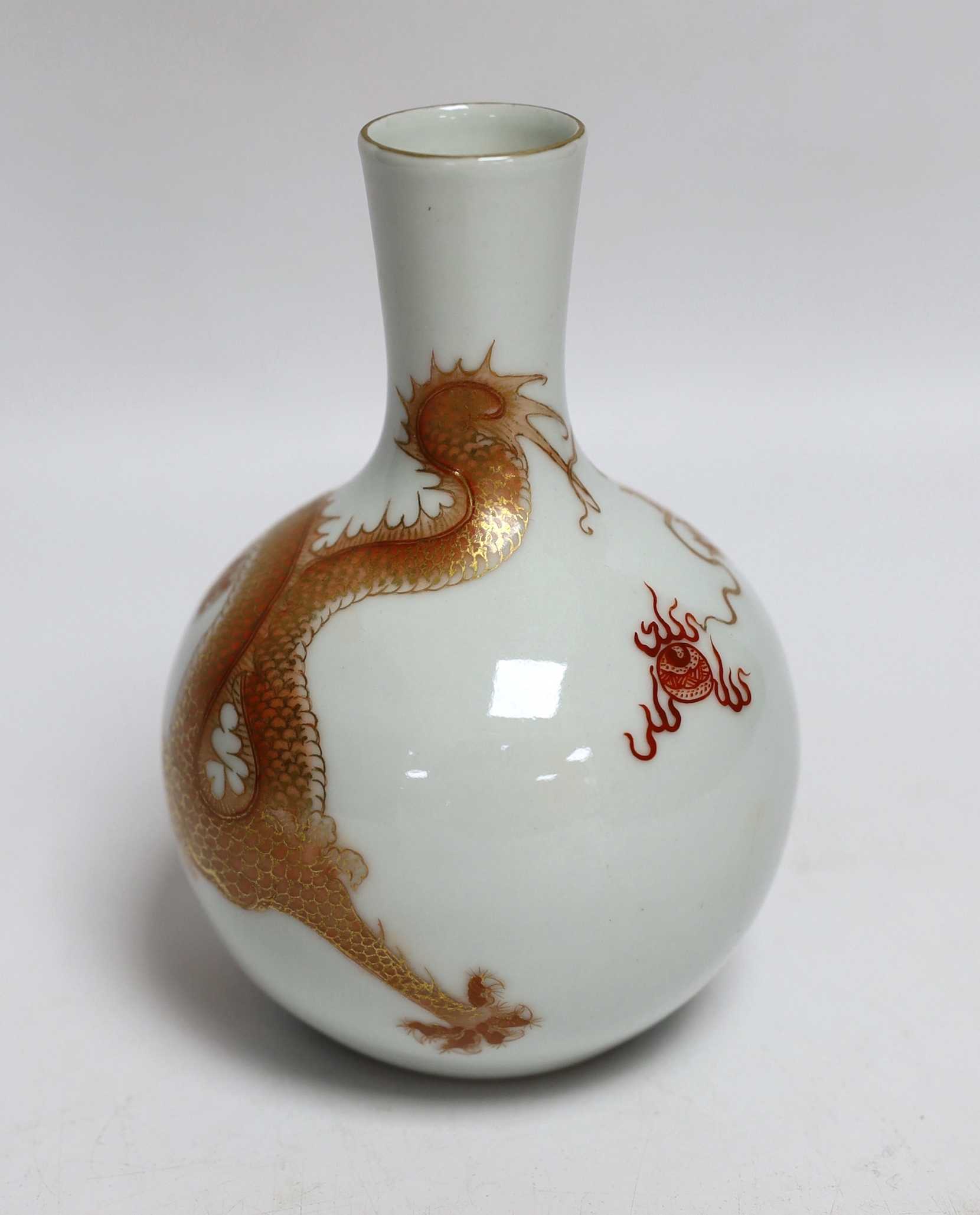 A Chinese rouge de fer dragon bottle vase, 14cm high (boxed)